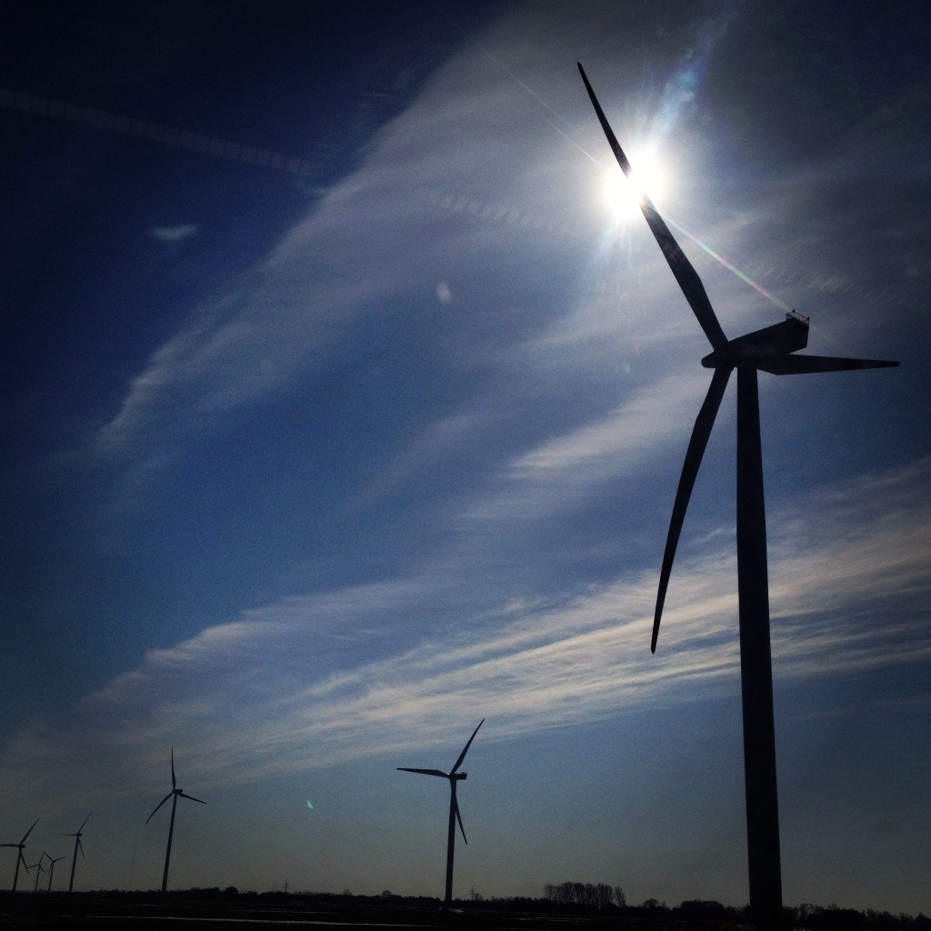 Seen from a train window- Wind Turbines, somewhere in a field in North Germany