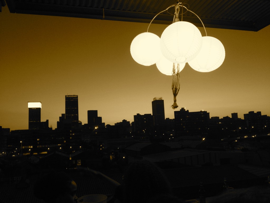 Perfect place to end the day in Maboneng is high up on the rooftop of Main Change - Living Room, an eco bar/cafe which offers tasty snacks, drinks and stunning panoramic views of Jozi.