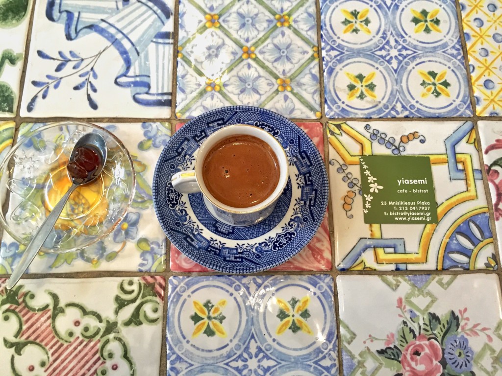 Breakfast in Athens at cafe, bistrot. Yiasemi. Thick medium sweet Greek coffee with grapes in syrup. They do a fabulous range of pies ( tart with eggplant, feta & basil for eg) for just €5