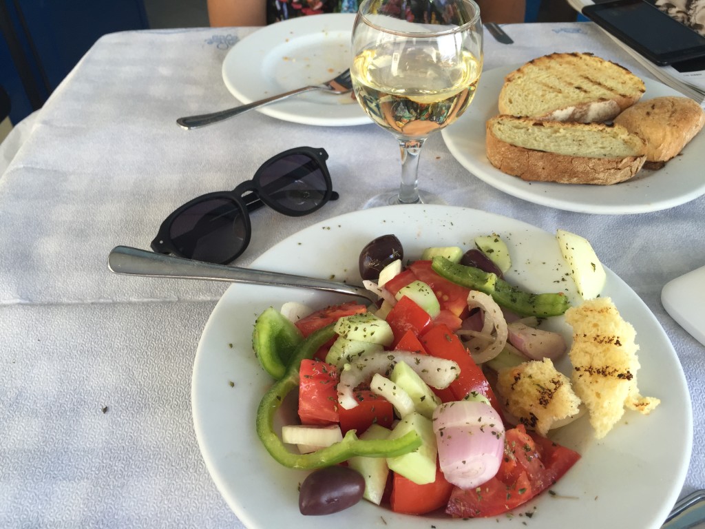 Happiness is dipping bread into a delicious Greek salad. Take me back to Athens right now!