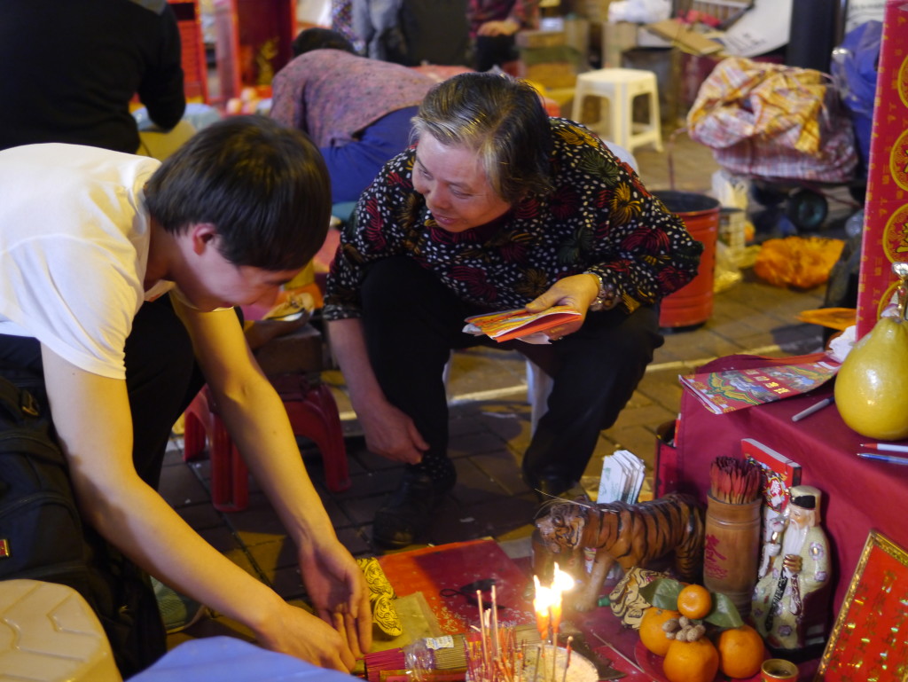 One of the curious religious rituals I observed when in Hong Kong was that of 'villain hitting' in the Canal Road Flyover. 'Villain hitters' earn a living by putting curses on their clients enemies. The ritual will involve writing down the 'evil spirits' name on paper and details such as the enemies date of birth. The hitter then picks up some harmless slipper from the corner of her booth and start hitting hard on the paper for 10 minutes, accompanied by the chant of evil curses. There are many ways the ritual is performed. Whichever you see it, it is a unique part of local culture and something that was fascinating to witness.